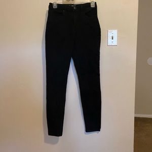 Black high rise skinny jeans worn twice.